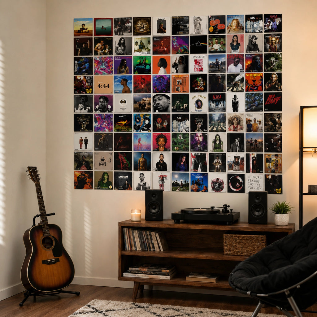 Modern music room decorated with 100 Album Cover Posters arranged as a 4×4 inch wall collage above a record player, creating stylish bedroom and living room wall decor for music lovers.