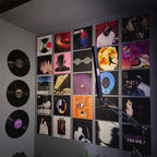 Modern bedroom decorated with album cover posters arranged in a stylish music wall collage, perfect for music lovers, dorm rooms, studios, and home decor.