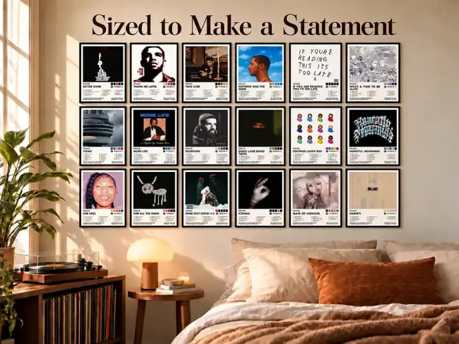 Set of 18 framed Drake album cover posters displayed above a bed in a warm, sunlit music-themed bedroom.