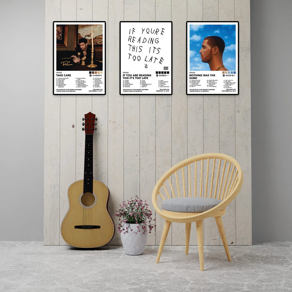 Modern room featuring three framed Drake album cover posters including Take Care, If You're Reading This It's Too Late, and Nothing Was the Same. Premium 8x12 inch music wall art for bedrooms, living rooms, studios, gaming rooms, and home decor.