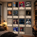 Fourteen J. Cole album-inspired posters displayed in a bedroom wall grid.