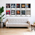 J. Cole posters arranged in two rows above a living room sofa.