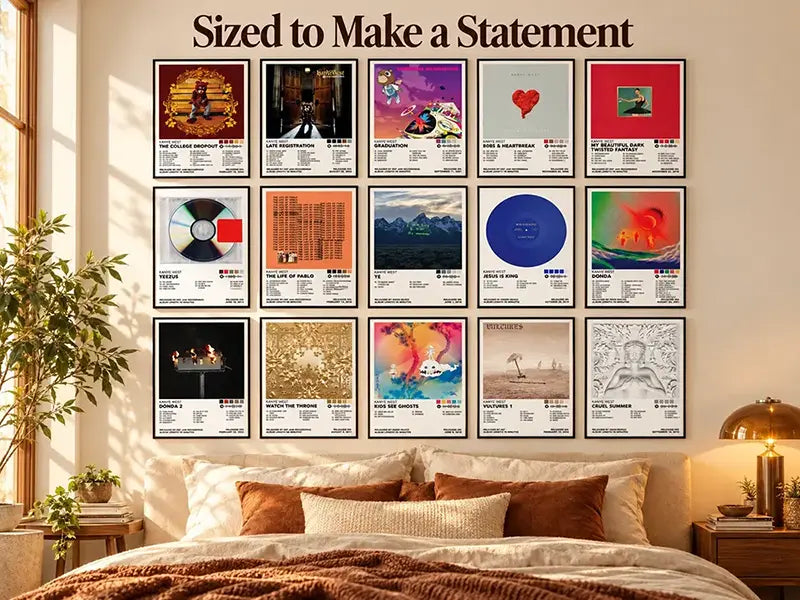 Kanye West album cover posters displayed in a warm bedroom gallery wall above a bed.