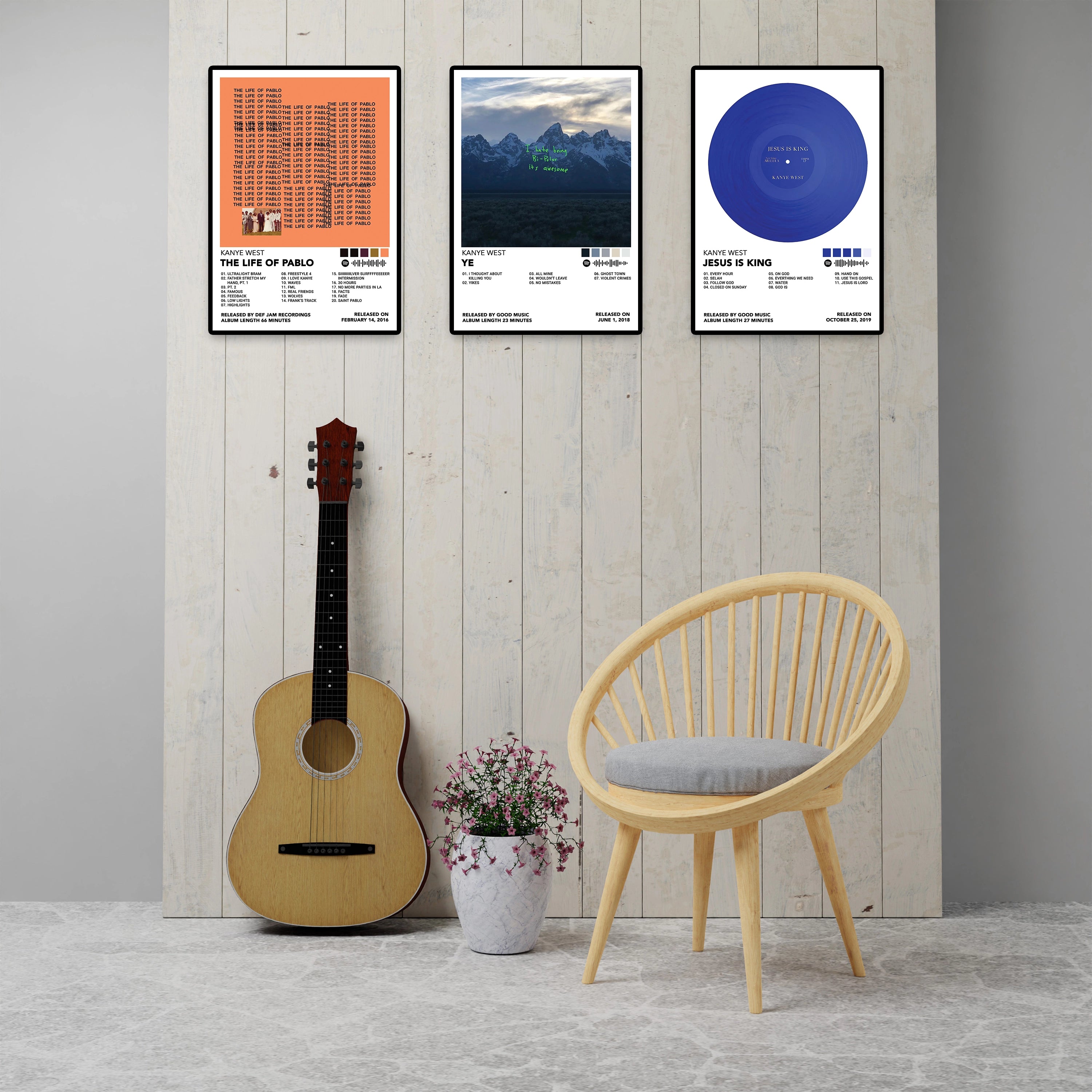 Modern room featuring three Kanye West album posters including The Life of Pablo, Ye, and Jesus Is King displayed above a guitar and chair. Premium 8x12 inch unframed music wall art for hip-hop fans and modern home decor.