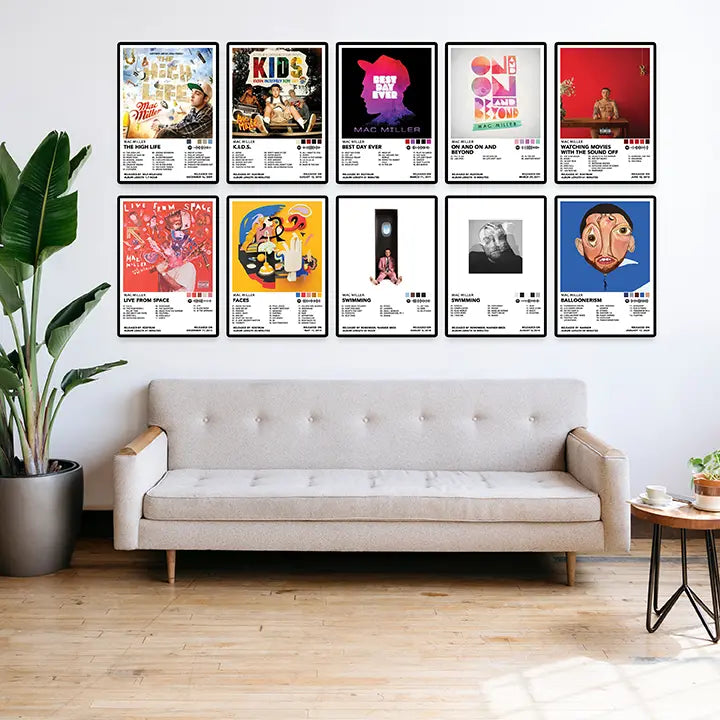 Ten framed Mac Miller album cover posters displayed above a sofa in a bright living room.