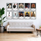 Ten framed Michael Jackson album cover posters arranged in two rows above a sofa in a bright living room.